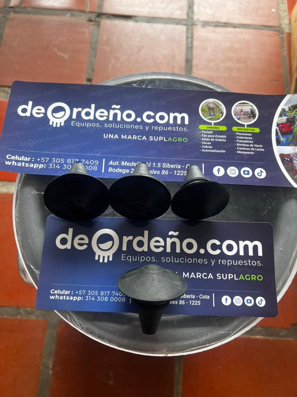 Tapones de pezonera para cerrar el cuarto que no se ordeña — foto real