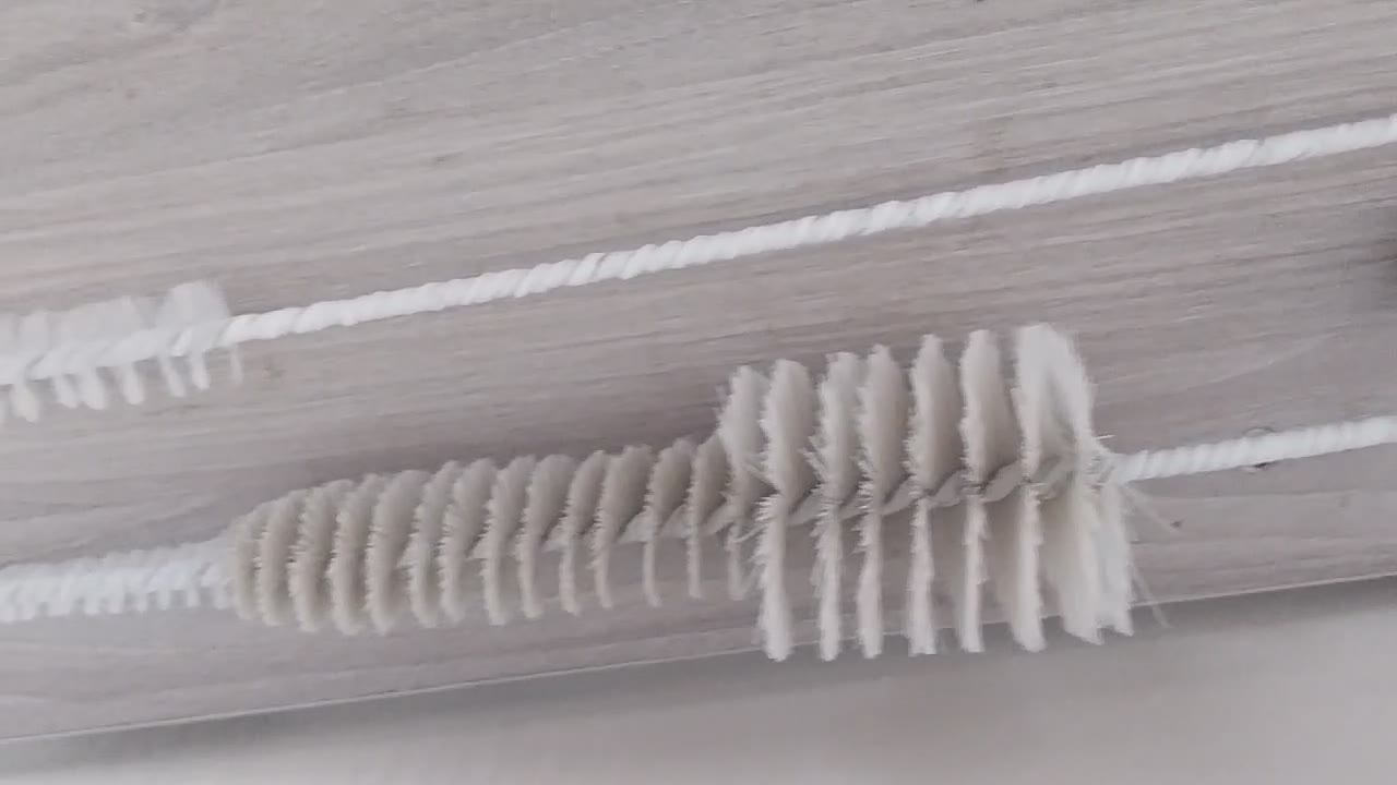 Cepillo de lavado de ordeño con su mango de madera