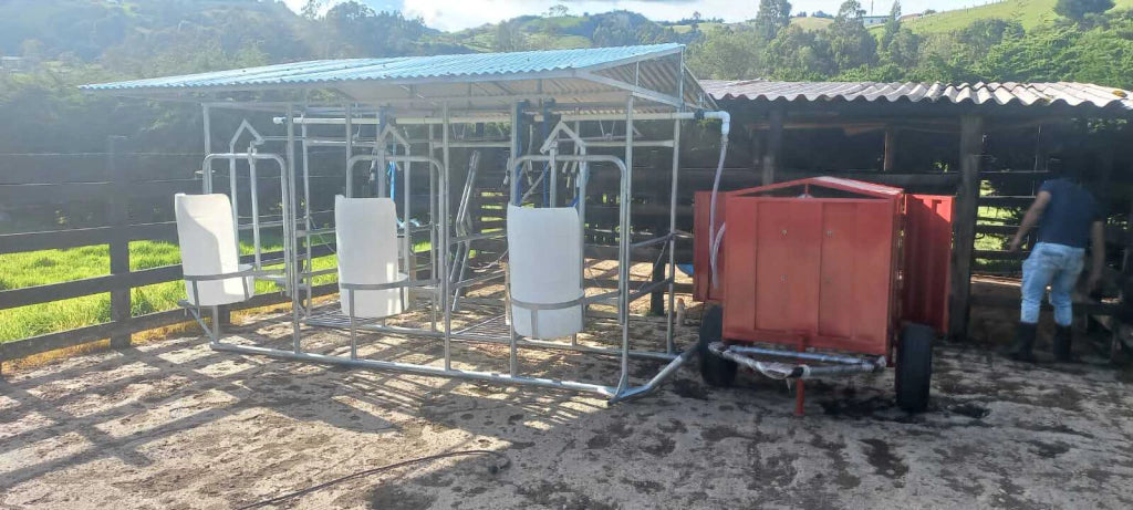 Caseta de ordeño conectada a un establo de ordeño